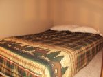 Upper level bedroom 4 with queen bed, lofted full bed